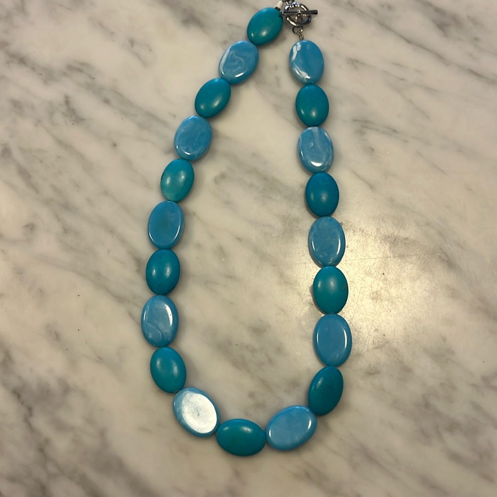 Turquoise colored beaded necklace 21”